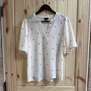 Ann Taylor short-sleeve blouse, a V-neck, puffed sleeves & elasticized cuffs,